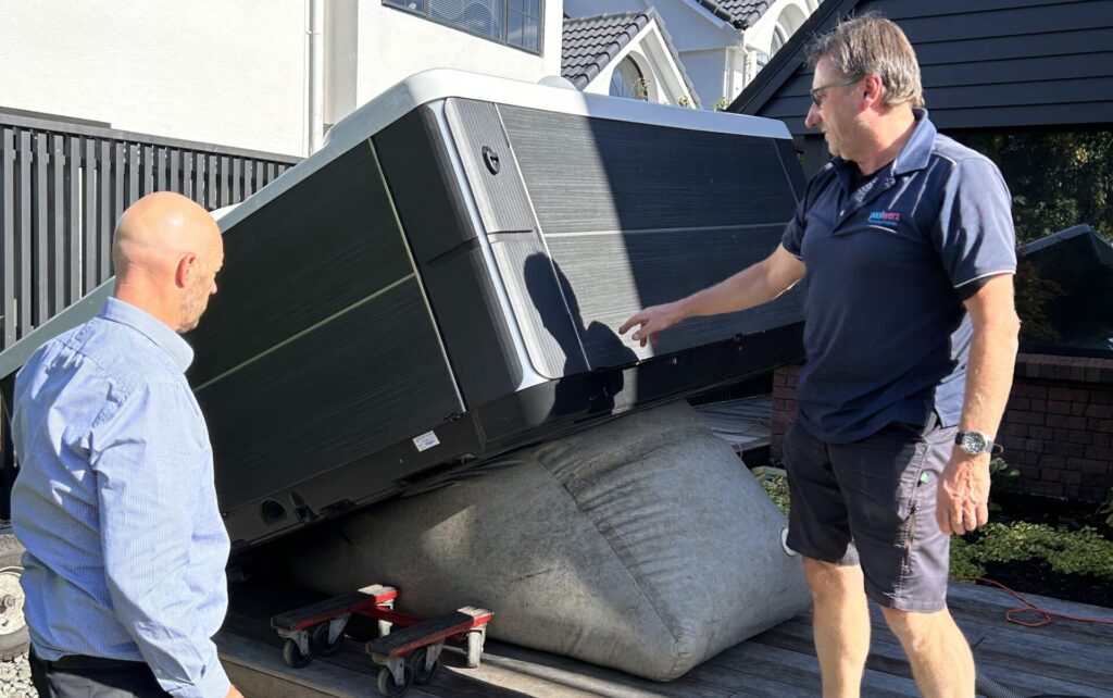 Lowering a spa pool on an airbag