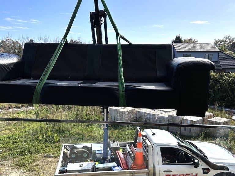 Large_Couch_being_moved_by_Reach_Cranes